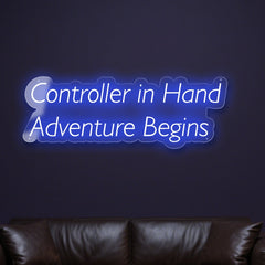 controller-in-hand-adventure-begins-neon-sign