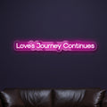 love-s-journey-continues-neon-sign