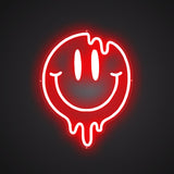 Lächelndes Gesicht schmilzt Neonschild